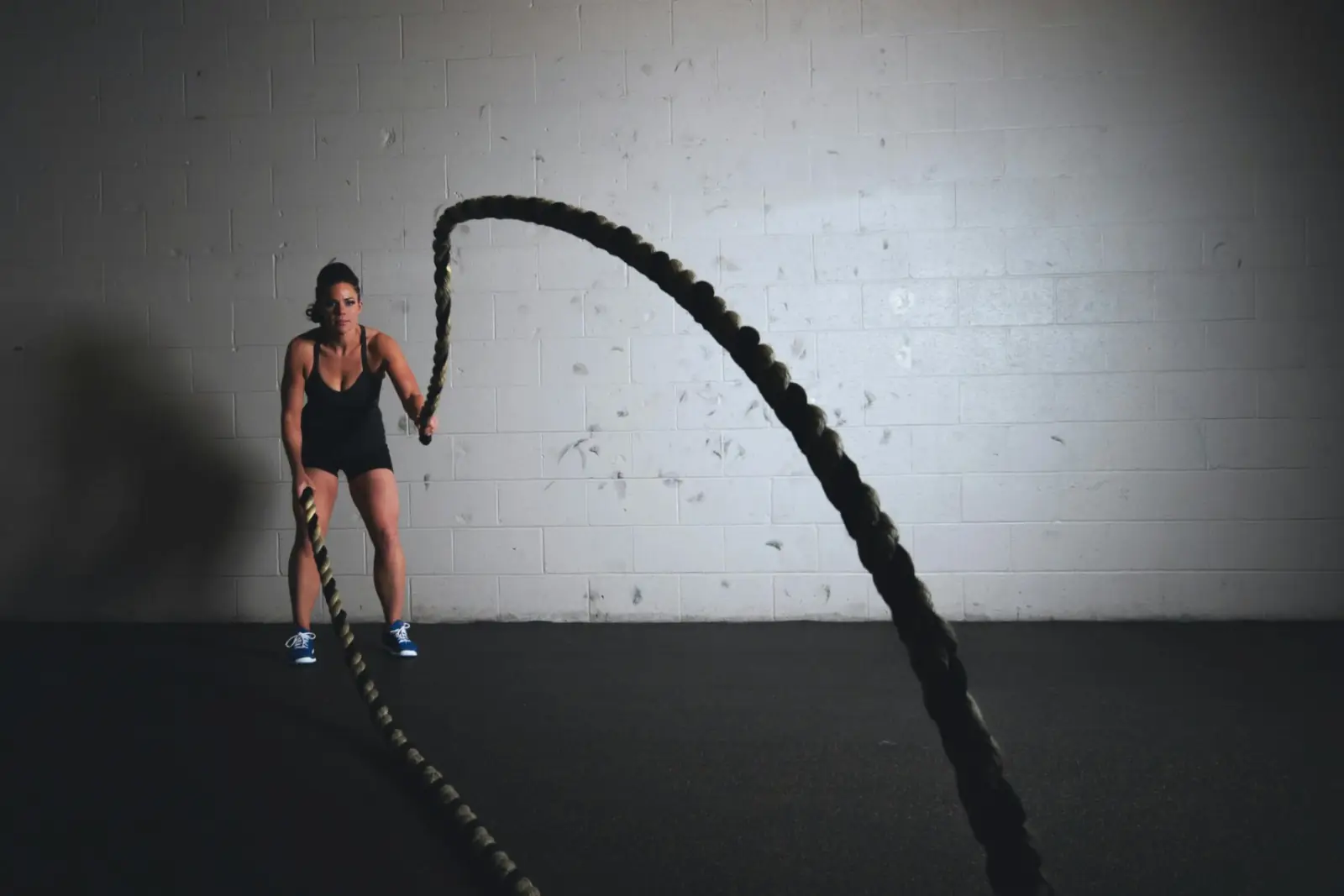 Personal training session with battle ropes